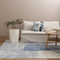 Cloud Blue Abstract Washable Rug styled with furniture