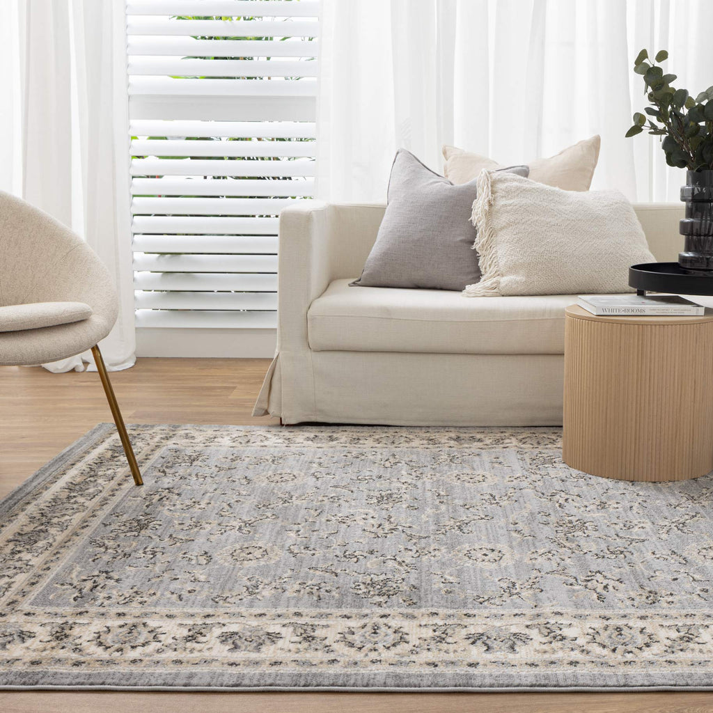 Arya Grey Cream Border Rug - 1691 GREY styled with furniture