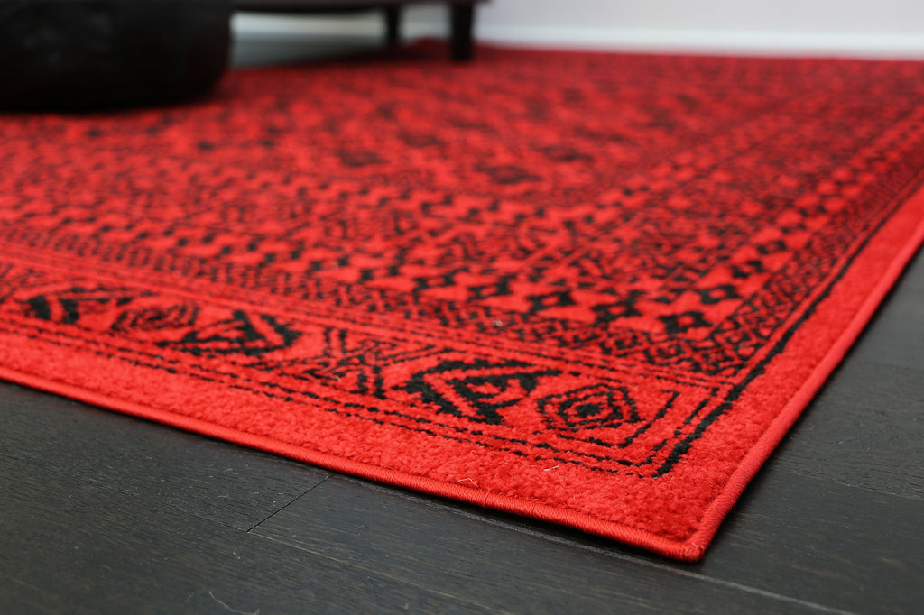 Tribe Red Black Traditional Rug - 18678 10 styled with furniture