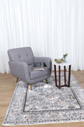 Almeras 23647-110 Grey Multicolour Floral Border Rug styled with furniture
