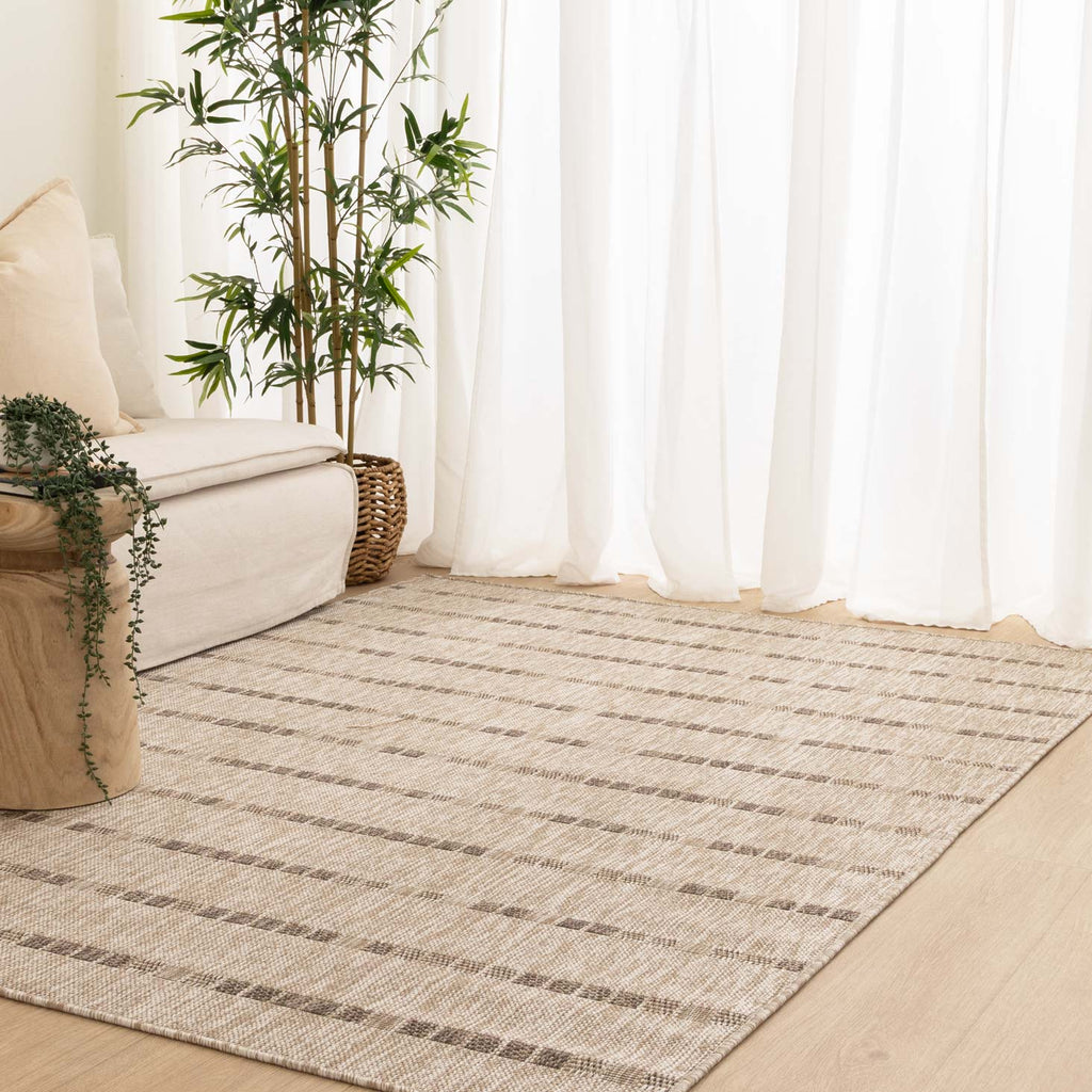Sisalo 3529 UT6-D Beige Linear Indoor Outdoor Rug styled with furniture