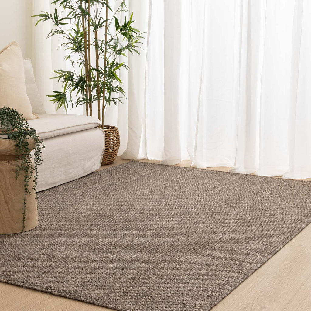 Sisalo 5724 UT6-D Brown Indoor Outdoor Rug styled with furniture