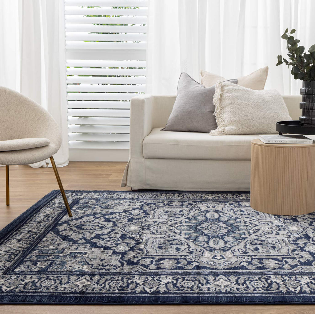 Arya 6097B Navy Traditional Rug styled with furniture