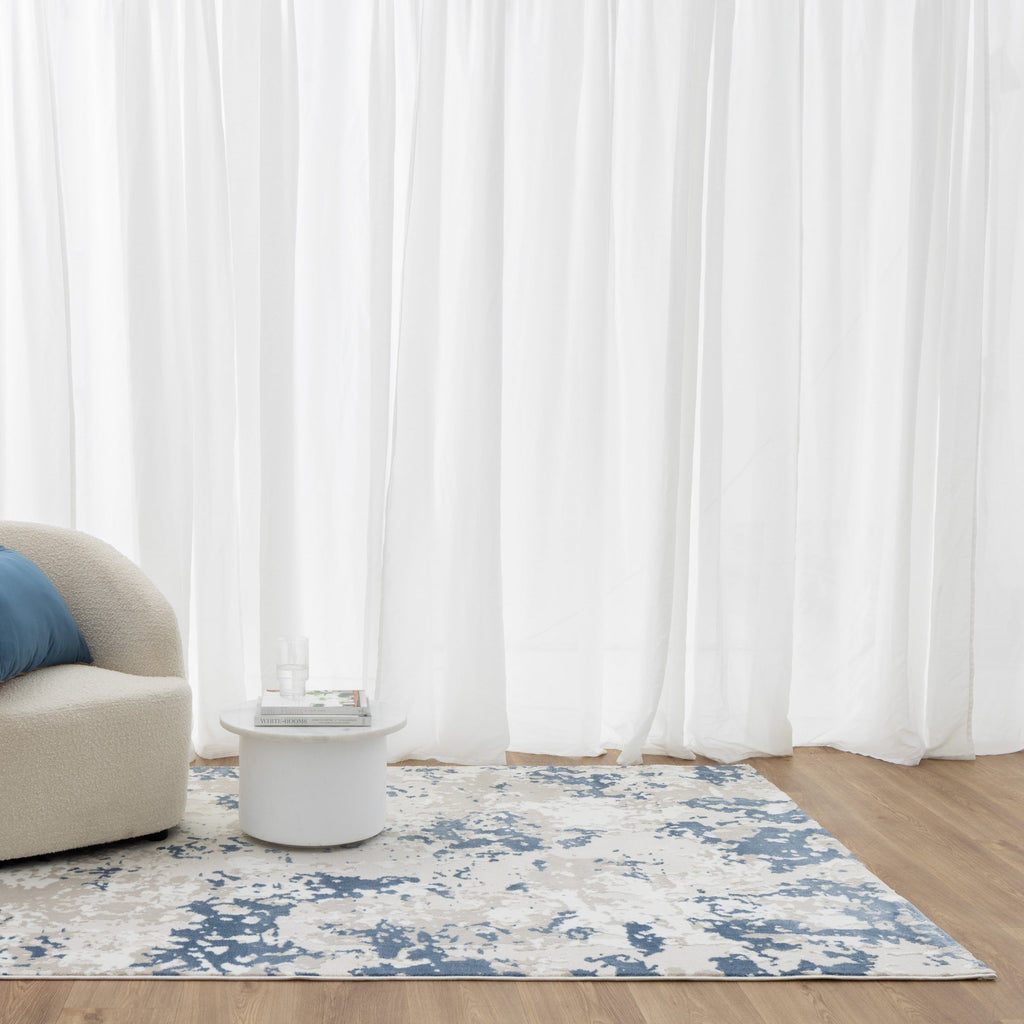 Amalfi Abstract Splash Blue Multi Rug - AMAL03 styled with furniture