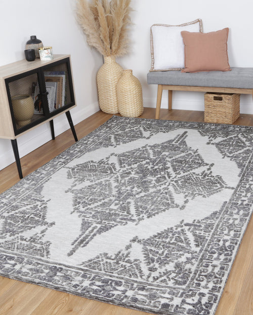 Amritsar Beas Grey Geometric Rug styled with furniture