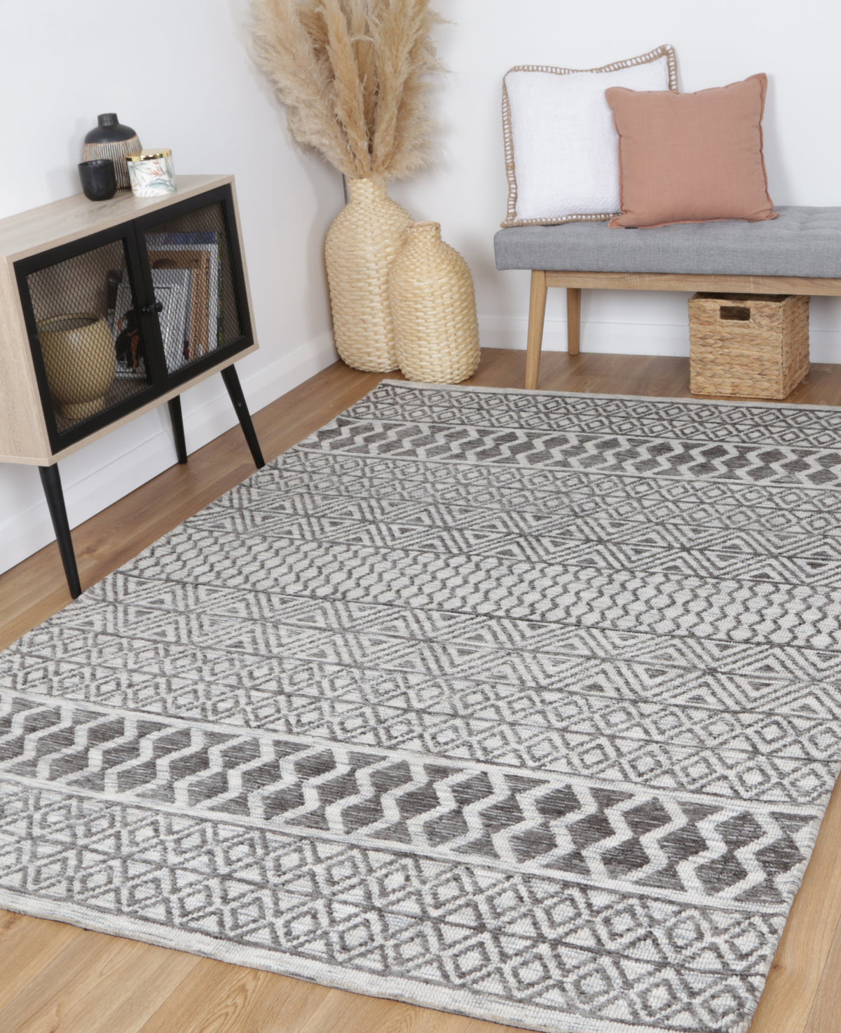 Amritsar Ramdass Charcoal & Beige Cotton Blend Rug styled with furniture