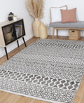 Amritsar Ramdass Grey Cotton Blend Rug styled with furniture