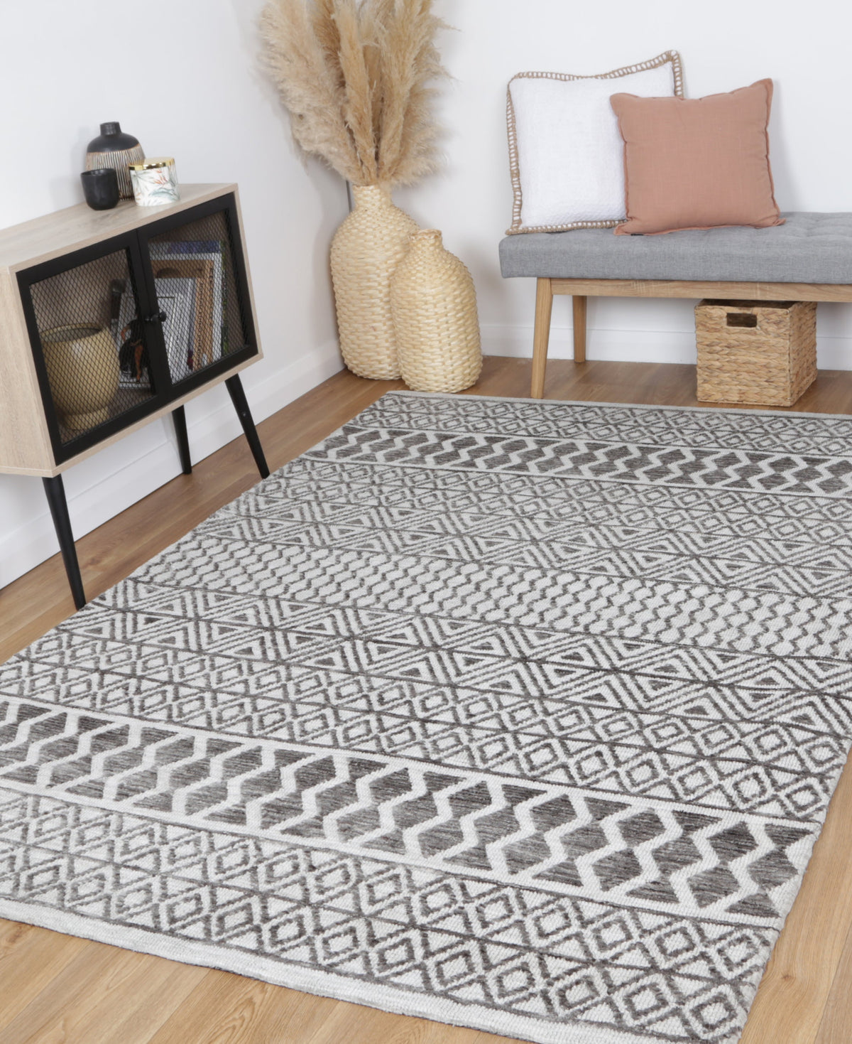 Amritsar Ramdass Grey Cotton Blend Rug styled with furniture