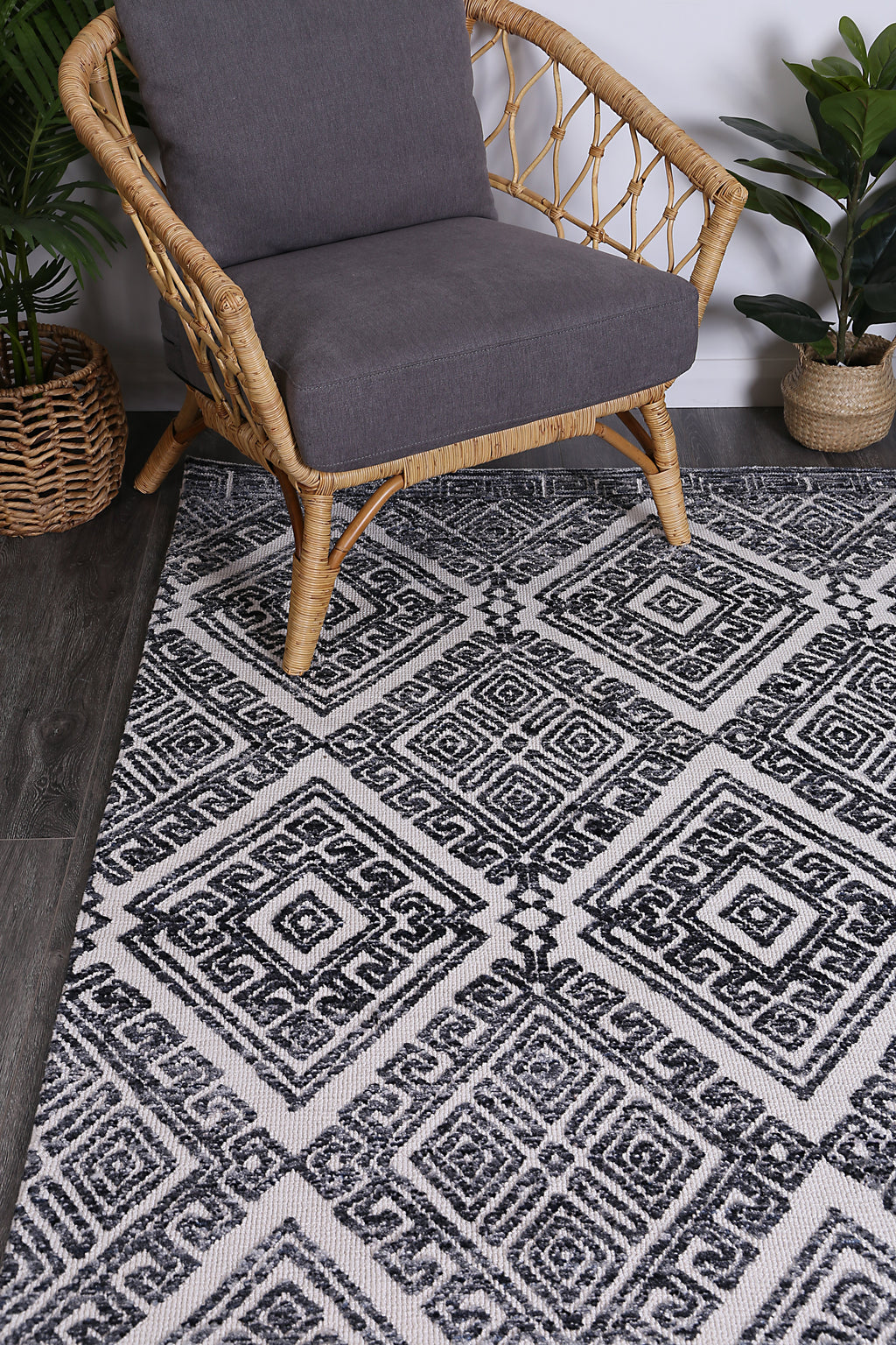Amritsar Glenfalls Anthracite Tribal Rug styled with furniture