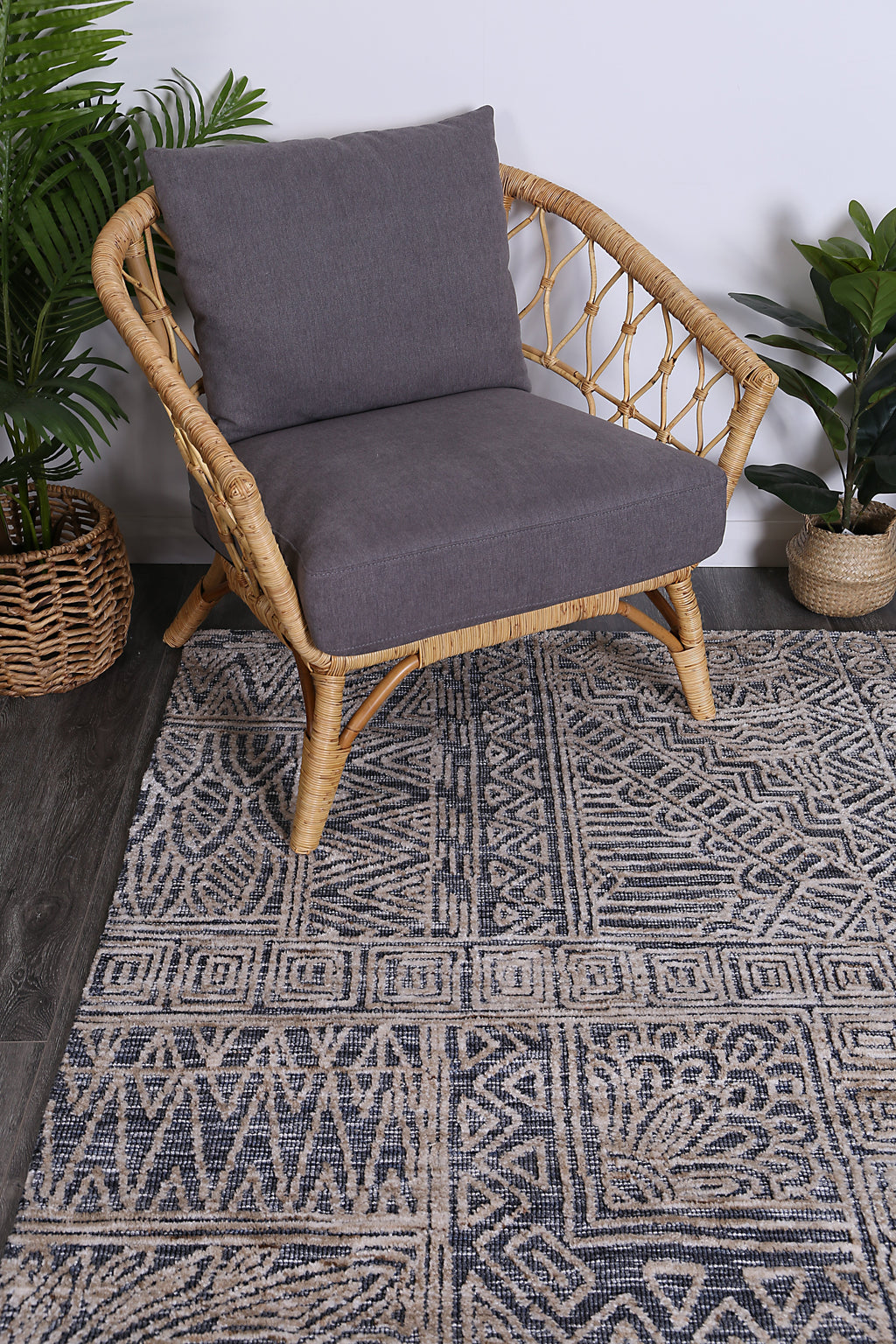Amritsar Newburg Anthracite Tribal Rug styled with furniture