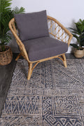 Amritsar Newburg Anthracite Tribal Rug styled with furniture