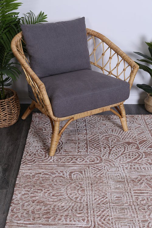 Amritsar Newburg Rust Tribal Rug styled with furniture