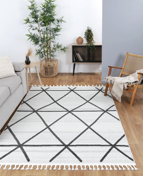 Ares Trojan Geometric Ivory and Anthracite Rug styled with furniture