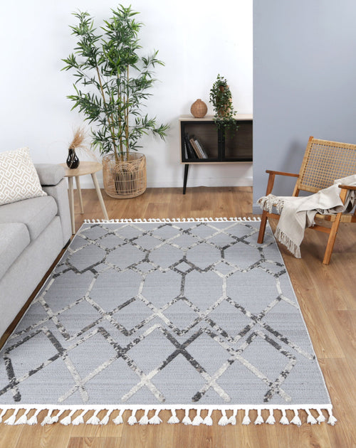 Ares Meliac Geometric Grey and Taupe Rug styled with furniture
