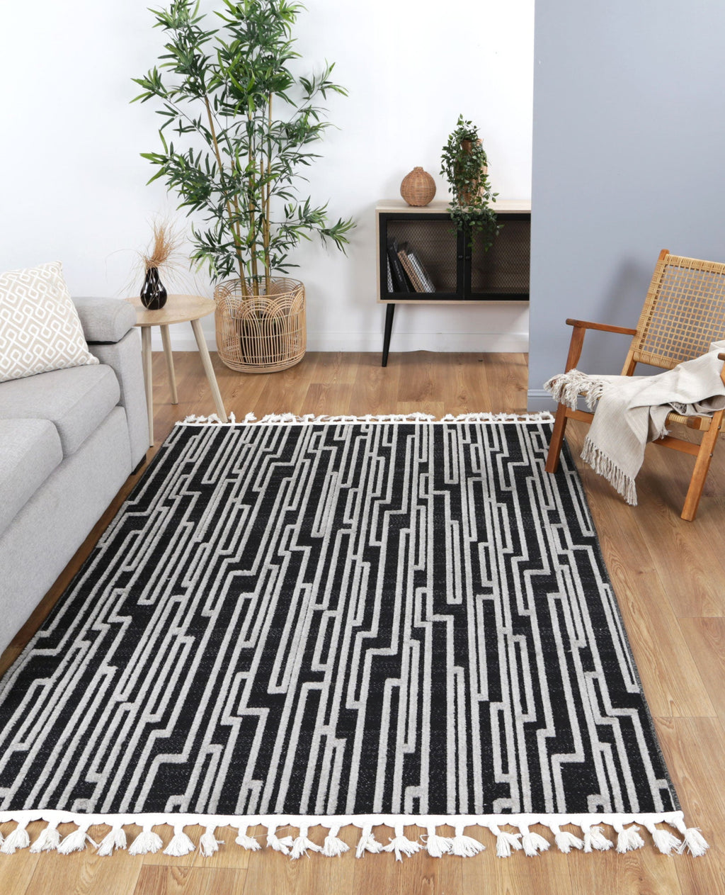 Ares Arcadia Geometric Black and White Rug styled with furniture