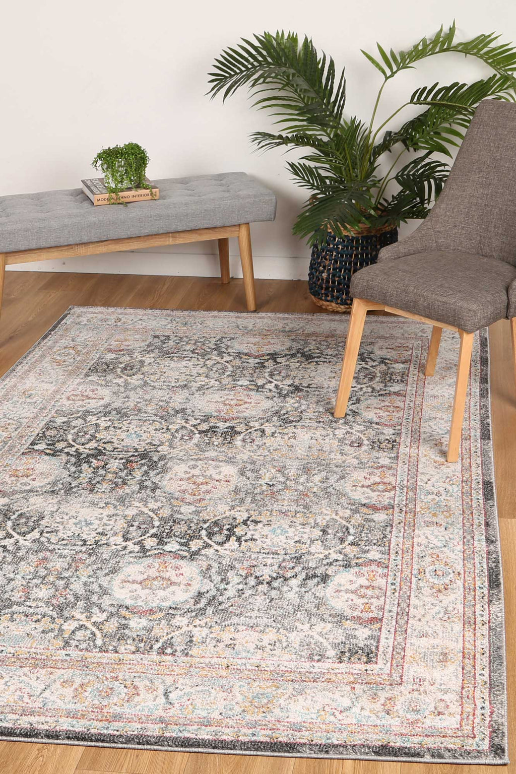 Artifact Shang Ogee Black and Red Rug styled with furniture