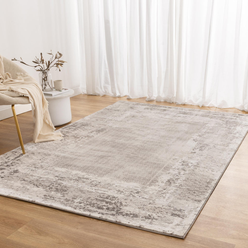 Atina Distressed Border Beige Grey Rug - AT04 styled with furniture