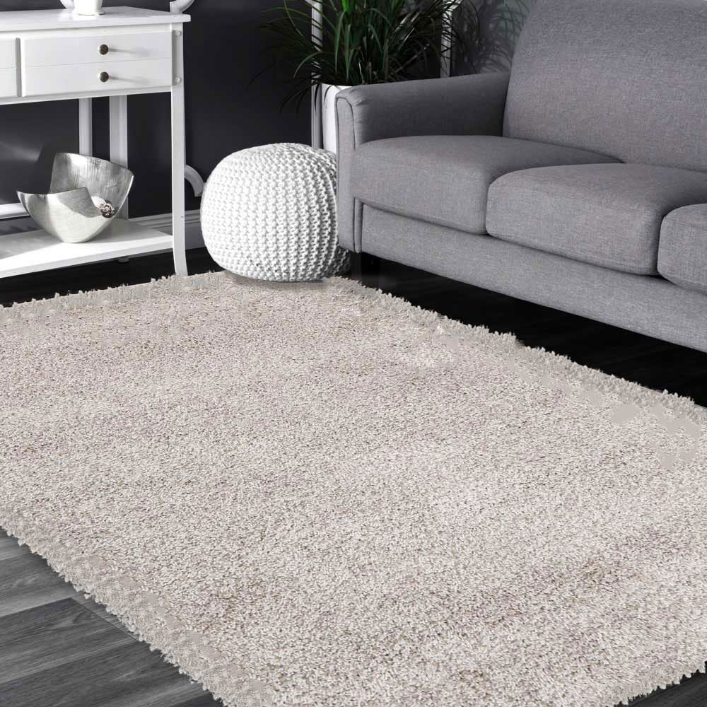 Austin Beige Cream Shaggy Rug styled with furniture
