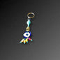 Aqua Bead Evil Eye Keyring-The Evil Eye Keyring is a symbol that protects from negative energy, harm, illness, and evil spirits. It has been around for 5000 years in various cultures and is also referred to as nazar, cheshm nazar, chashm-e-baddoor, nazar