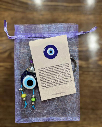 Aqua Bead Evil Eye Keyring-The Evil Eye Keyring is a symbol that protects from negative energy, harm, illness, and evil spirits. It has been around for 5000 years in various cultures and is also referred to as nazar, cheshm nazar, chashm-e-baddoor, nazar
