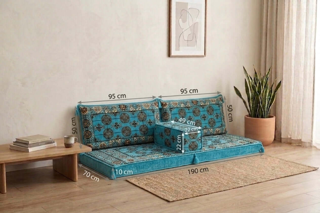 Arabian Majlis Divan Set in aqua, showcasing floor cushions and dimensions in a cozy living room setting.