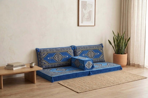 Arabian Majlis Divan Set in blue with geometric patterns displayed in a cozy seating area.