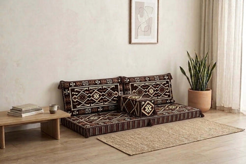 Arabian Majlis Divan Set showcasing traditional floor cushions in a cozy living room setting.