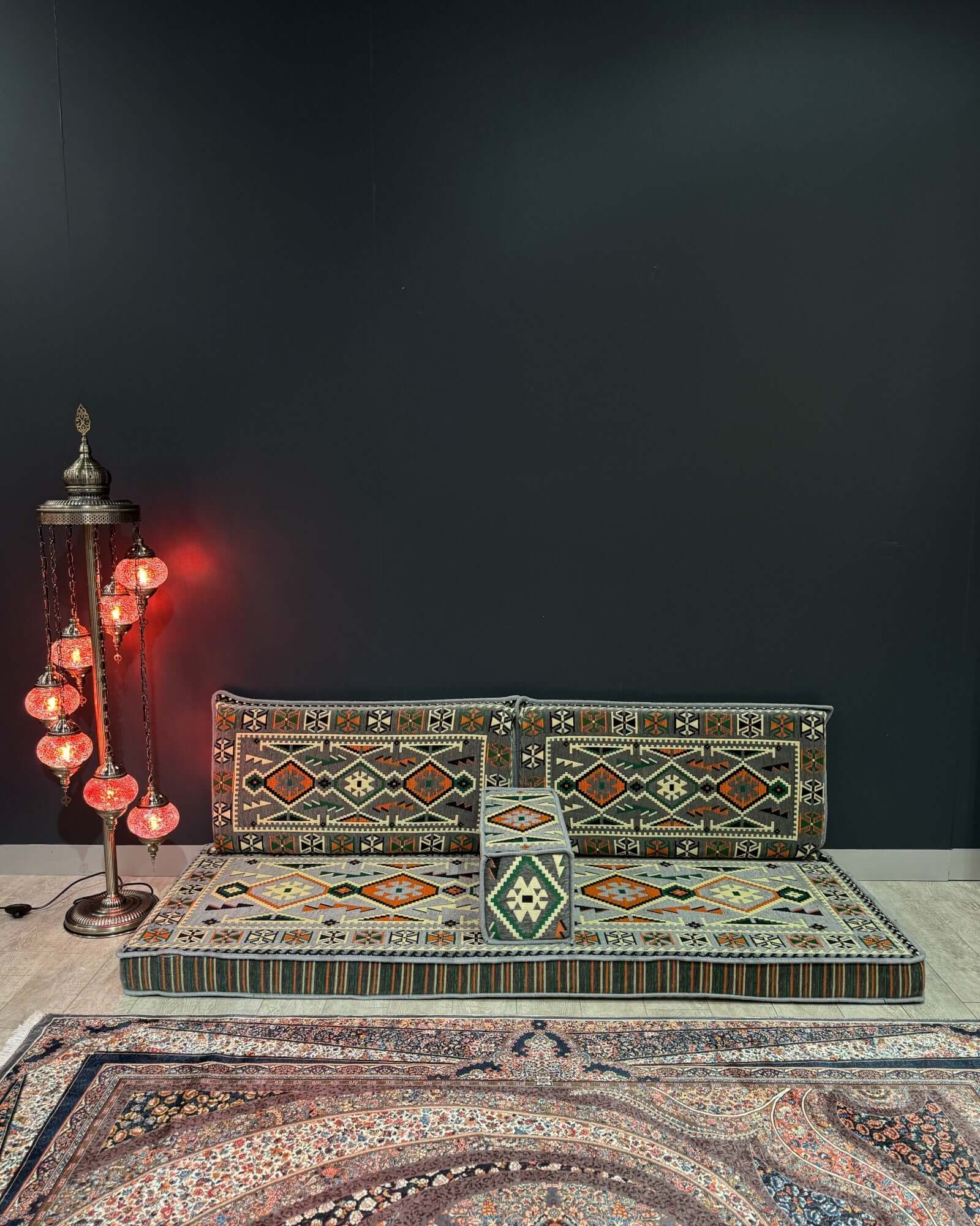Arabian Majlis Divan Set in a stylish living space with traditional patterns and elegant floor cushions.