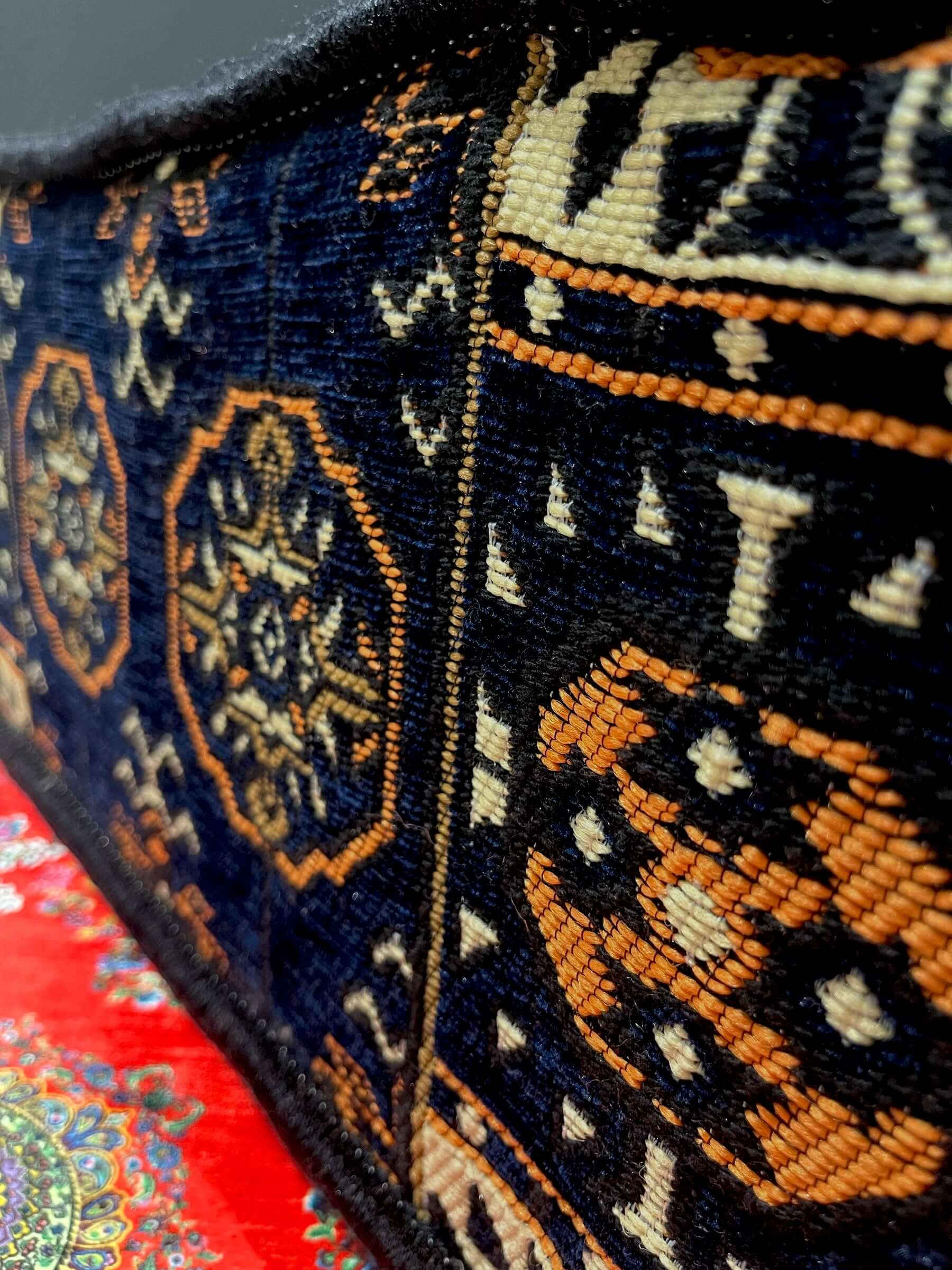 Traditional Turkish Armrest Cushion featuring intricate navy diamond patterns and artisanal design.