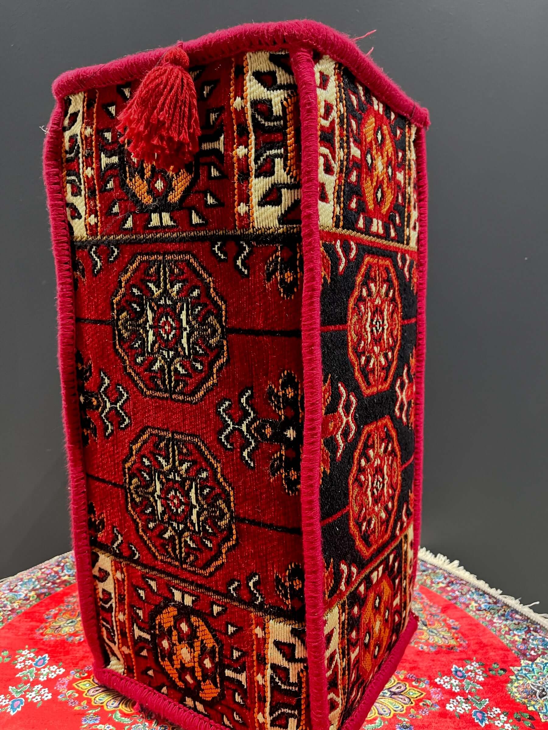 Traditional Turkish Armrest Cushion in vibrant red pattern, perfect for colorful floor seating support.