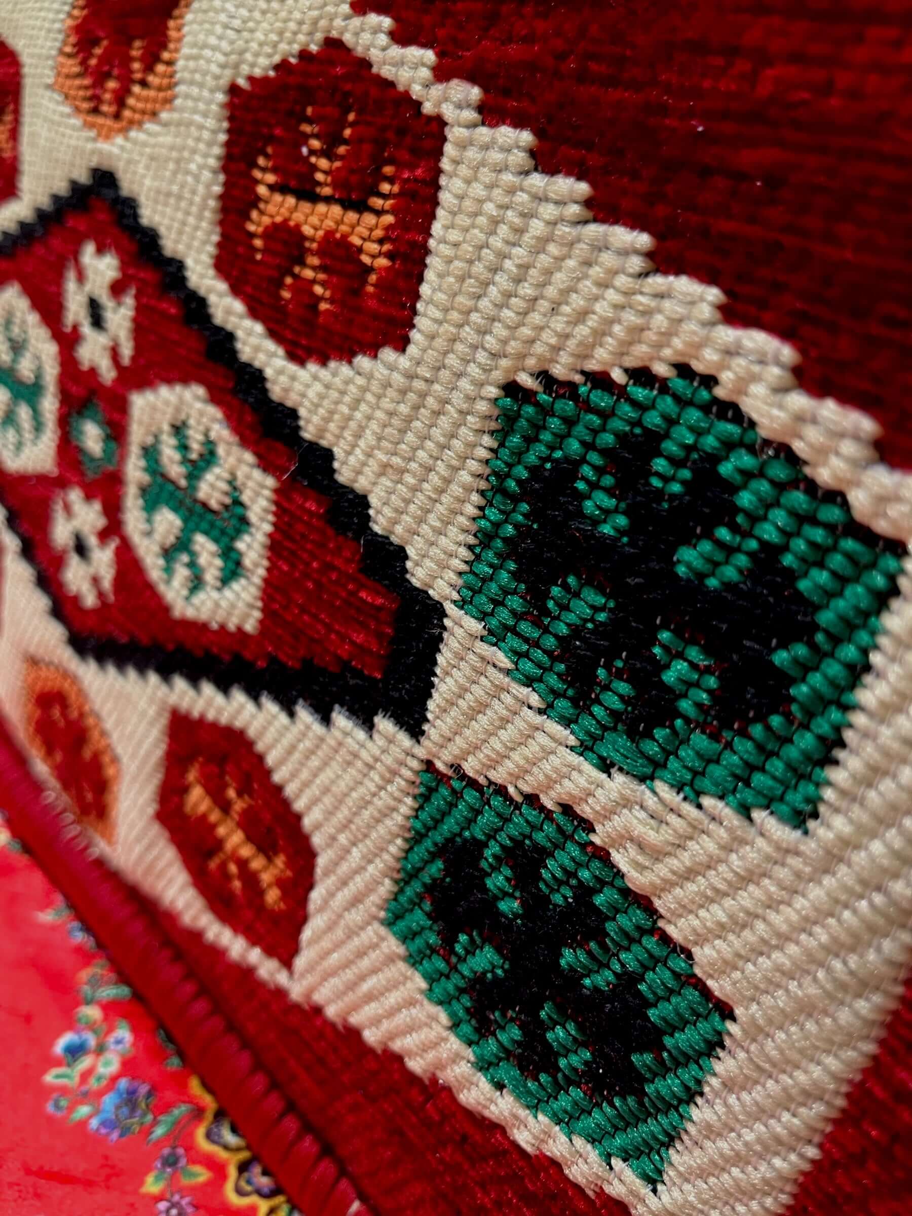 Traditional Turkish Armrest featuring intricate colorful patterns and textures.