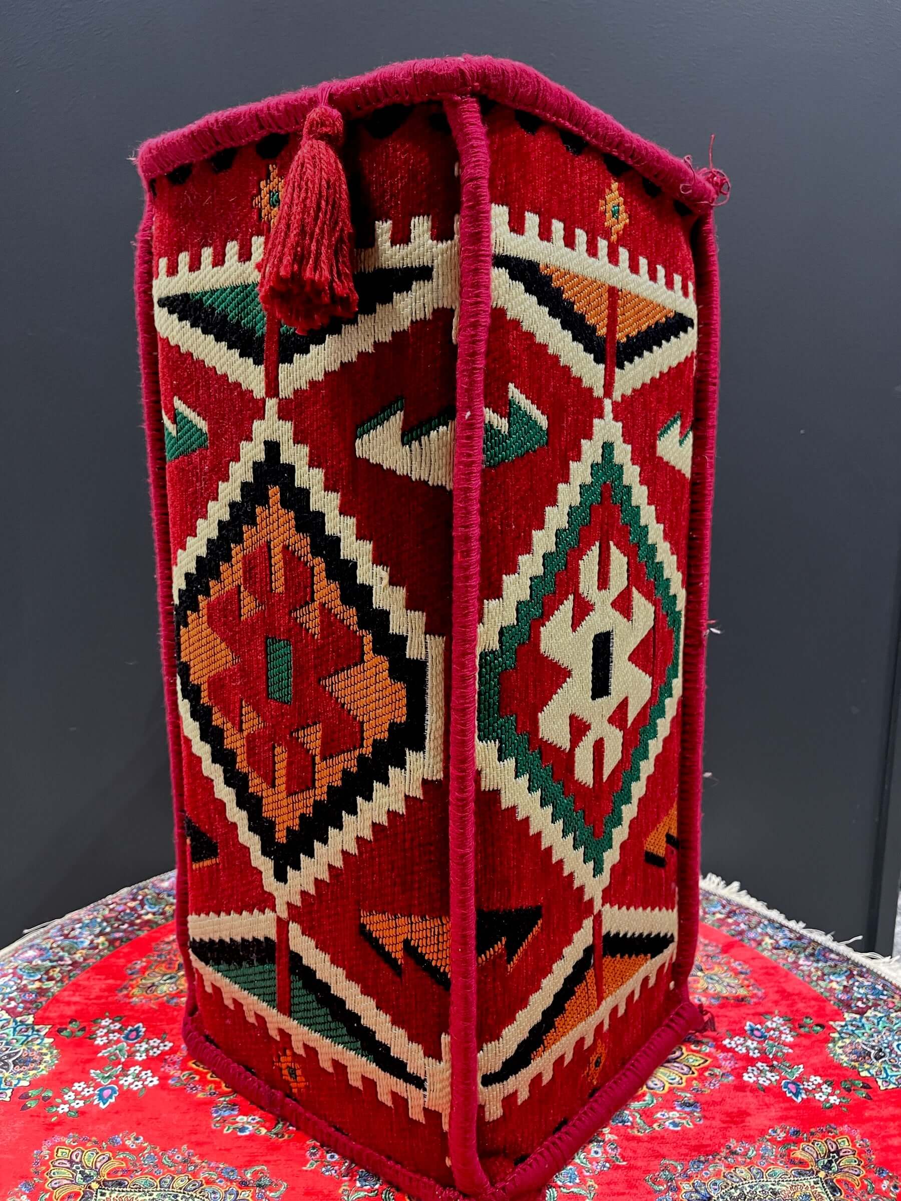 Traditional Turkish Armrest Cushion featuring vibrant red fabric and intricate geometric patterns.