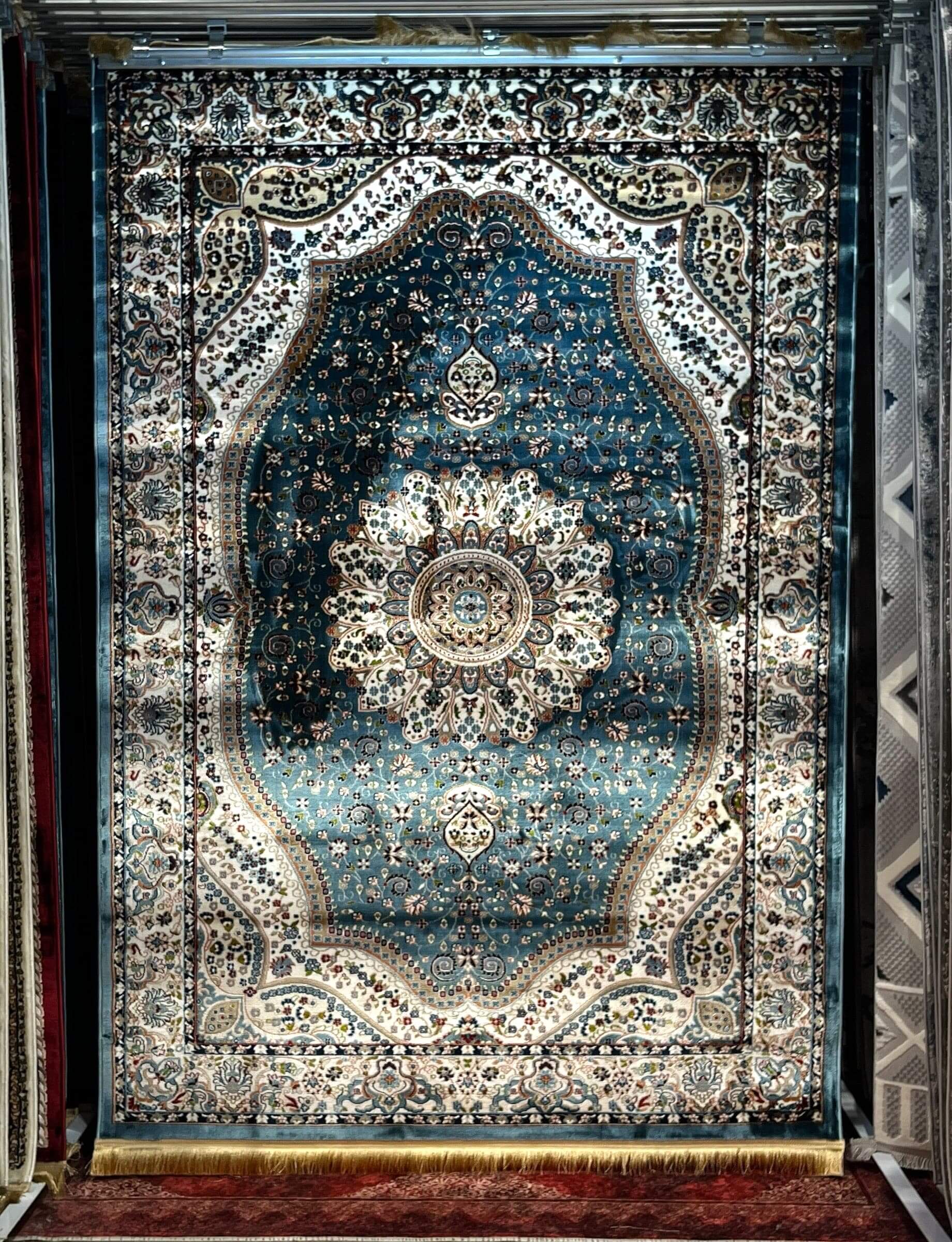 Asaryun Turkish Rugs Bazaar G-Discover the perfect blend of tradition and modernity with our Turkish polyester rug. Featuring a rich blue background with intricate patterns, this durable, easy-to-maintain rug adds elegance to any space. Ideal for high-tra