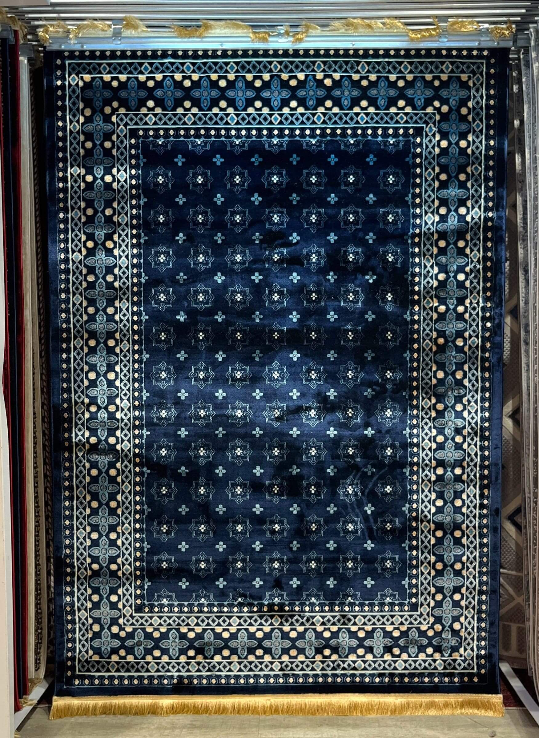 Asaryun Turkish Rugs Bazaar G-Discover the perfect blend of tradition and modernity with our Turkish polyester rug. Featuring a rich blue background with intricate patterns, this durable, easy-to-maintain rug adds elegance to any space. Ideal for high-tra