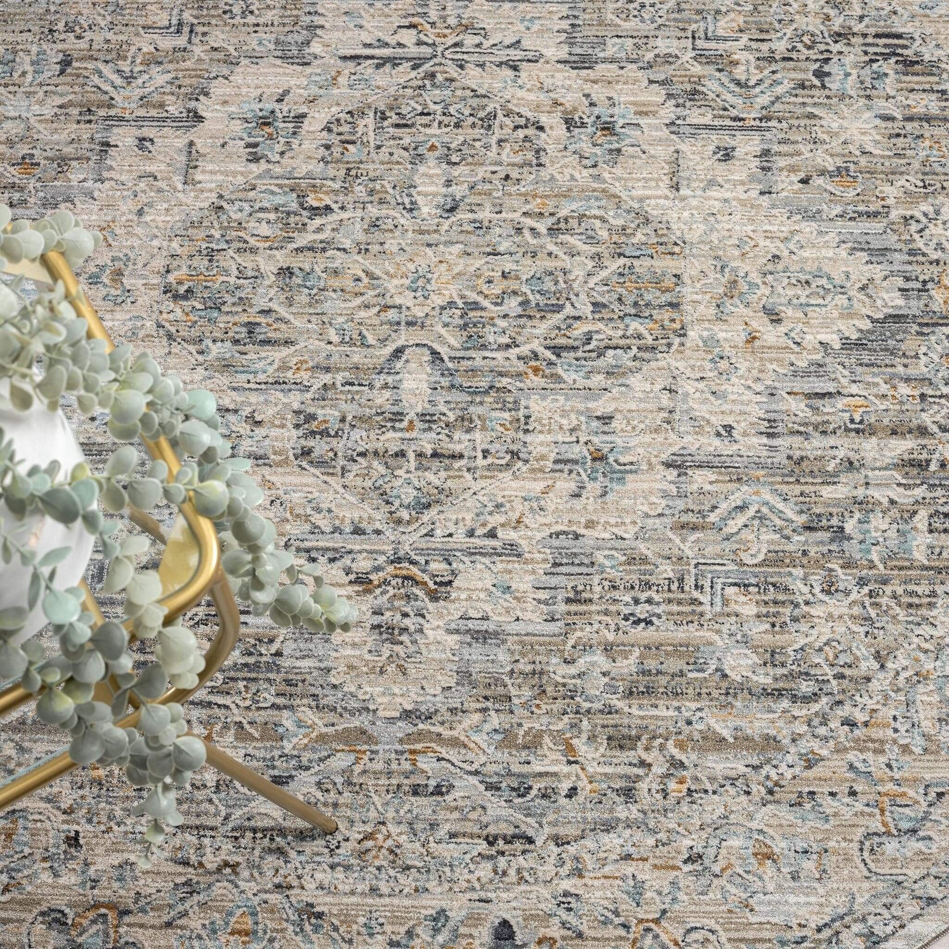 Aubrey 6753 Taupe Round-This exquisite collection has all the hallmarks of a perfect combination of design, colour and texture. The modern take on traditional oriental patterns in this superb range are reflected beautifully on a durable, cross-woven pile