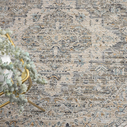 Aubrey 6753 Taupe Round-This exquisite collection has all the hallmarks of a perfect combination of design, colour and texture. The modern take on traditional oriental patterns in this superb range are reflected beautifully on a durable, cross-woven pile