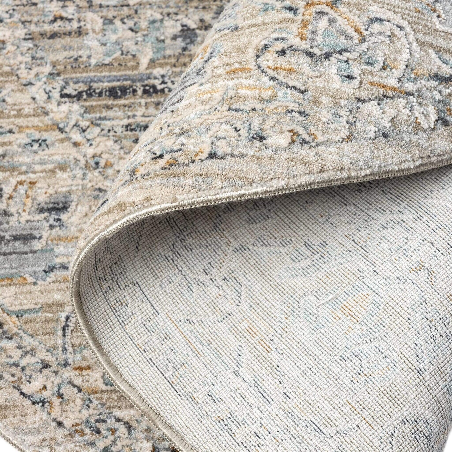 Aubrey 6753 Taupe Round-This exquisite collection has all the hallmarks of a perfect combination of design, colour and texture. The modern take on traditional oriental patterns in this superb range are reflected beautifully on a durable, cross-woven pile