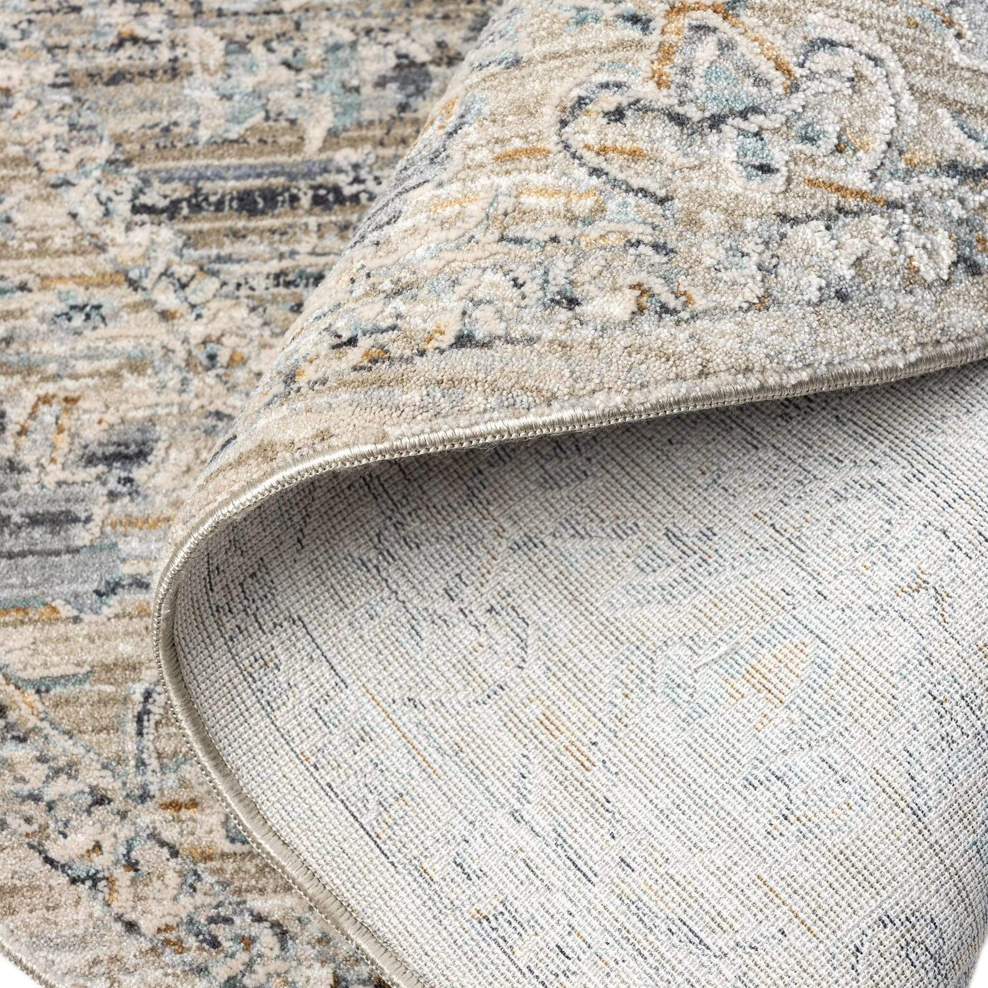 Aubrey 6753 Taupe Round-This exquisite collection has all the hallmarks of a perfect combination of design, colour and texture. The modern take on traditional oriental patterns in this superb range are reflected beautifully on a durable, cross-woven pile
