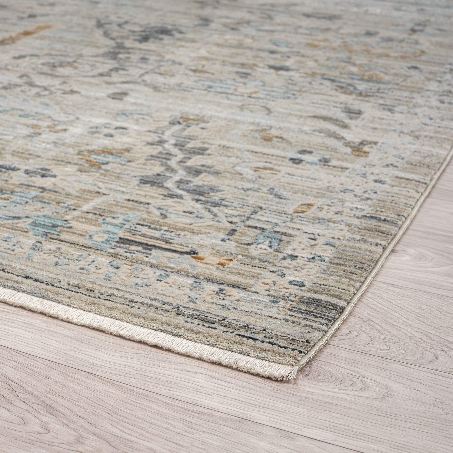 Aubrey 6755 Taupe-This exquisite collection has all the hallmarks of a perfect combination of design, colour and texture. The modern take on traditional oriental patterns in this superb range are reflected beautifully on a durable, cross-woven pile using