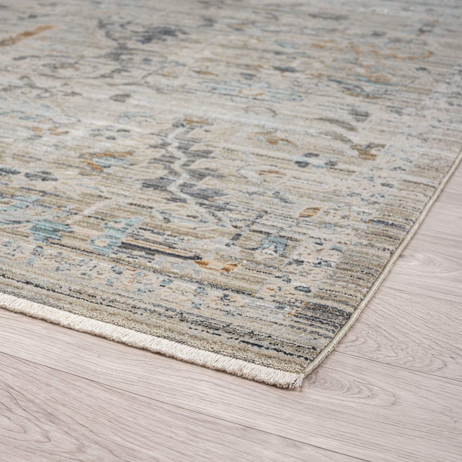 Aubrey 6755 Taupe-This exquisite collection has all the hallmarks of a perfect combination of design, colour and texture. The modern take on traditional oriental patterns in this superb range are reflected beautifully on a durable, cross-woven pile using