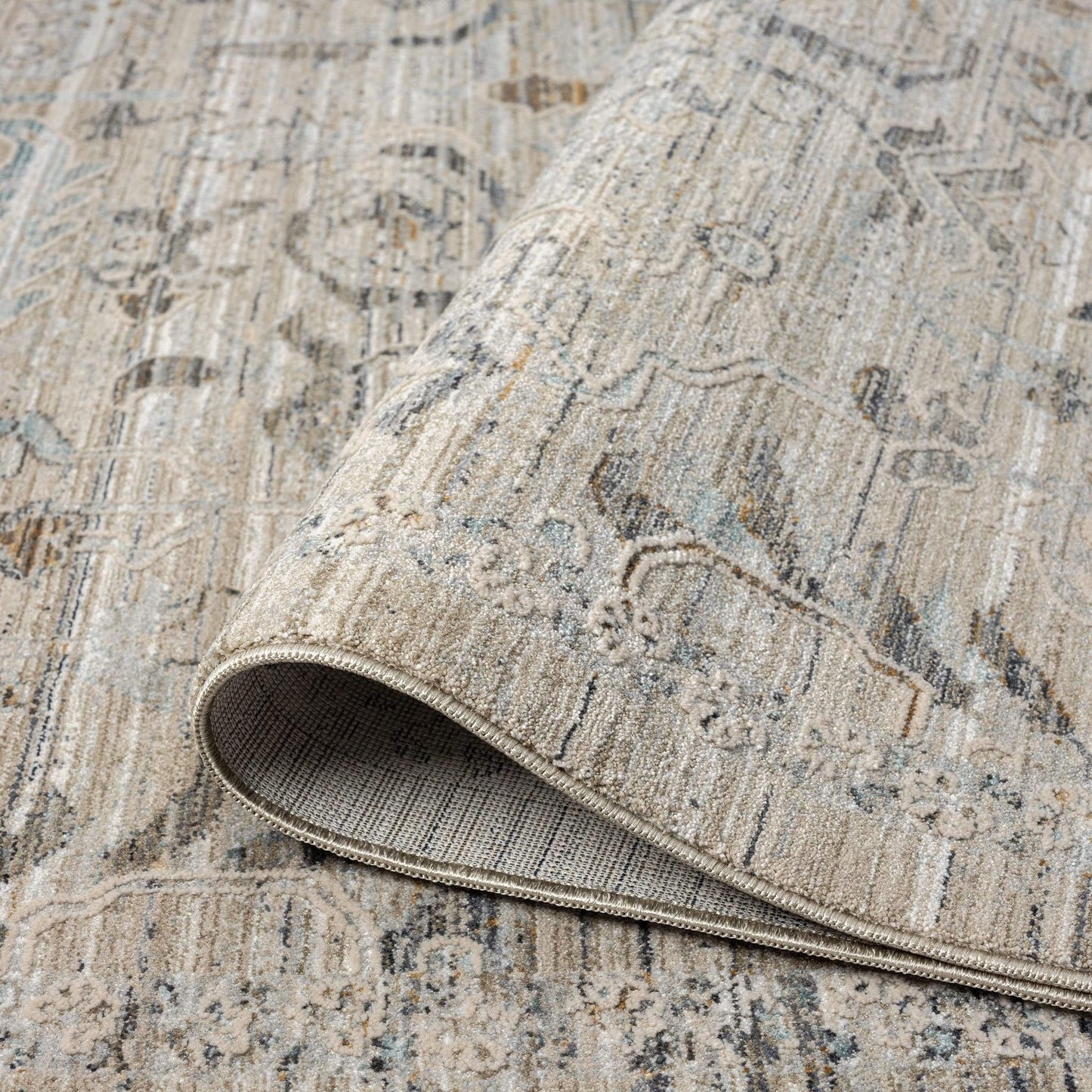 Aubrey 6755 Taupe-This exquisite collection has all the hallmarks of a perfect combination of design, colour and texture. The modern take on traditional oriental patterns in this superb range are reflected beautifully on a durable, cross-woven pile using