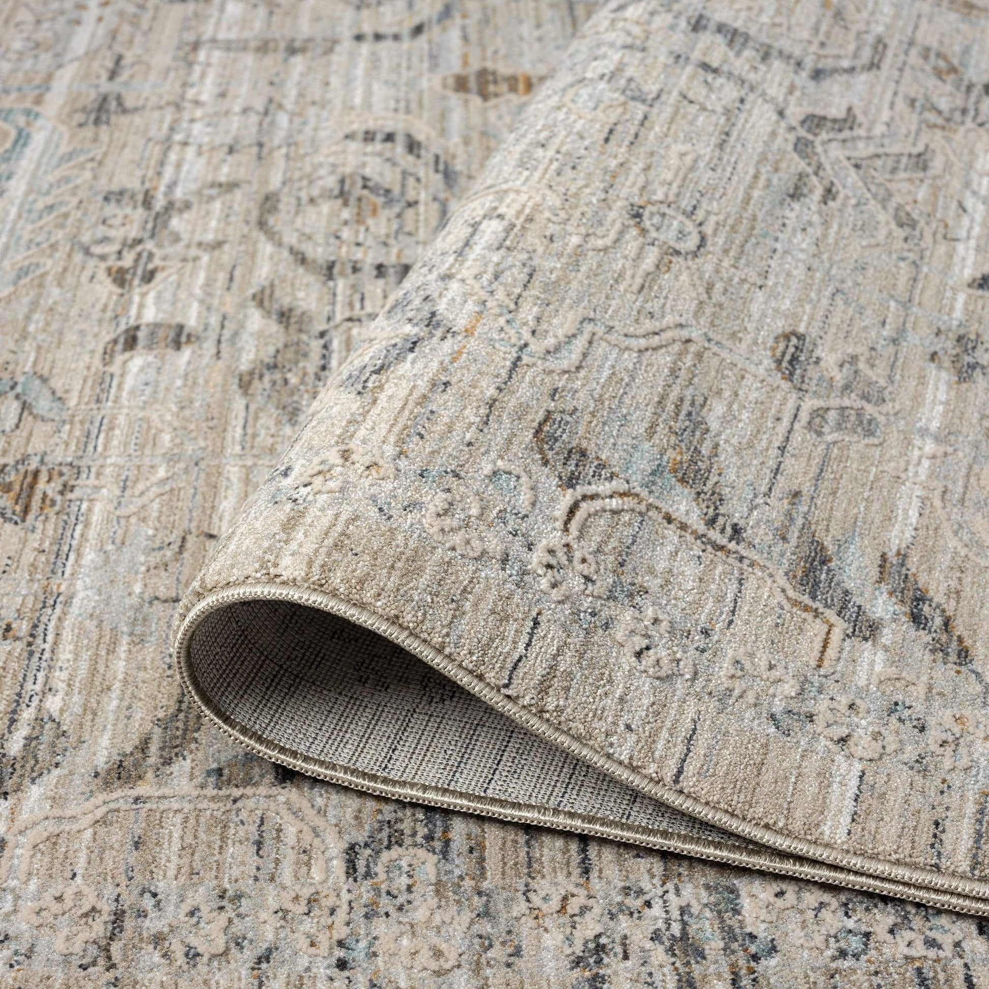 Aubrey 6755 Taupe-This exquisite collection has all the hallmarks of a perfect combination of design, colour and texture. The modern take on traditional oriental patterns in this superb range are reflected beautifully on a durable, cross-woven pile using