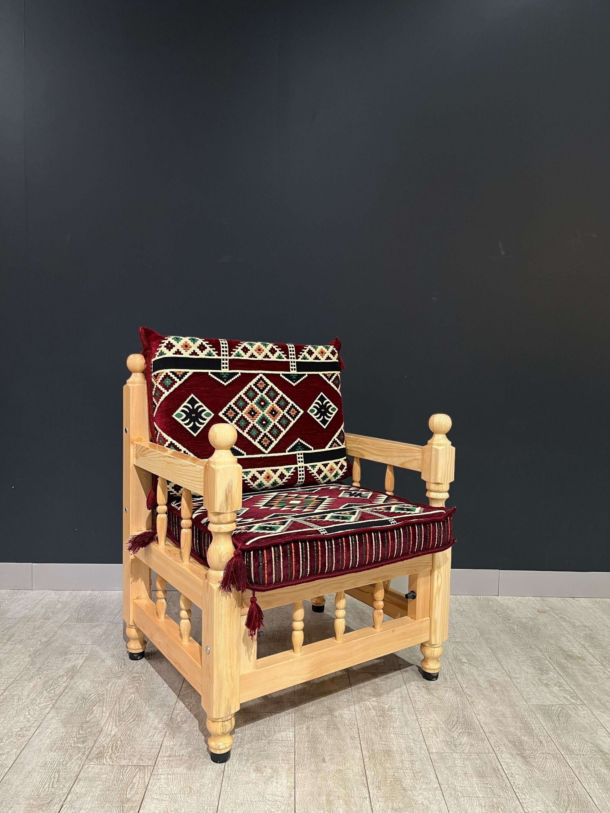 Authentic Armchair (Majlis Maroon Authentic)-Our Authentic Single Chair is expertly crafted from solid Wood Sedir and features Cotton Cushion covers and firm sponge for optimal comfort. Enjoy the comfort and luxury of this elegant chair. Free height under