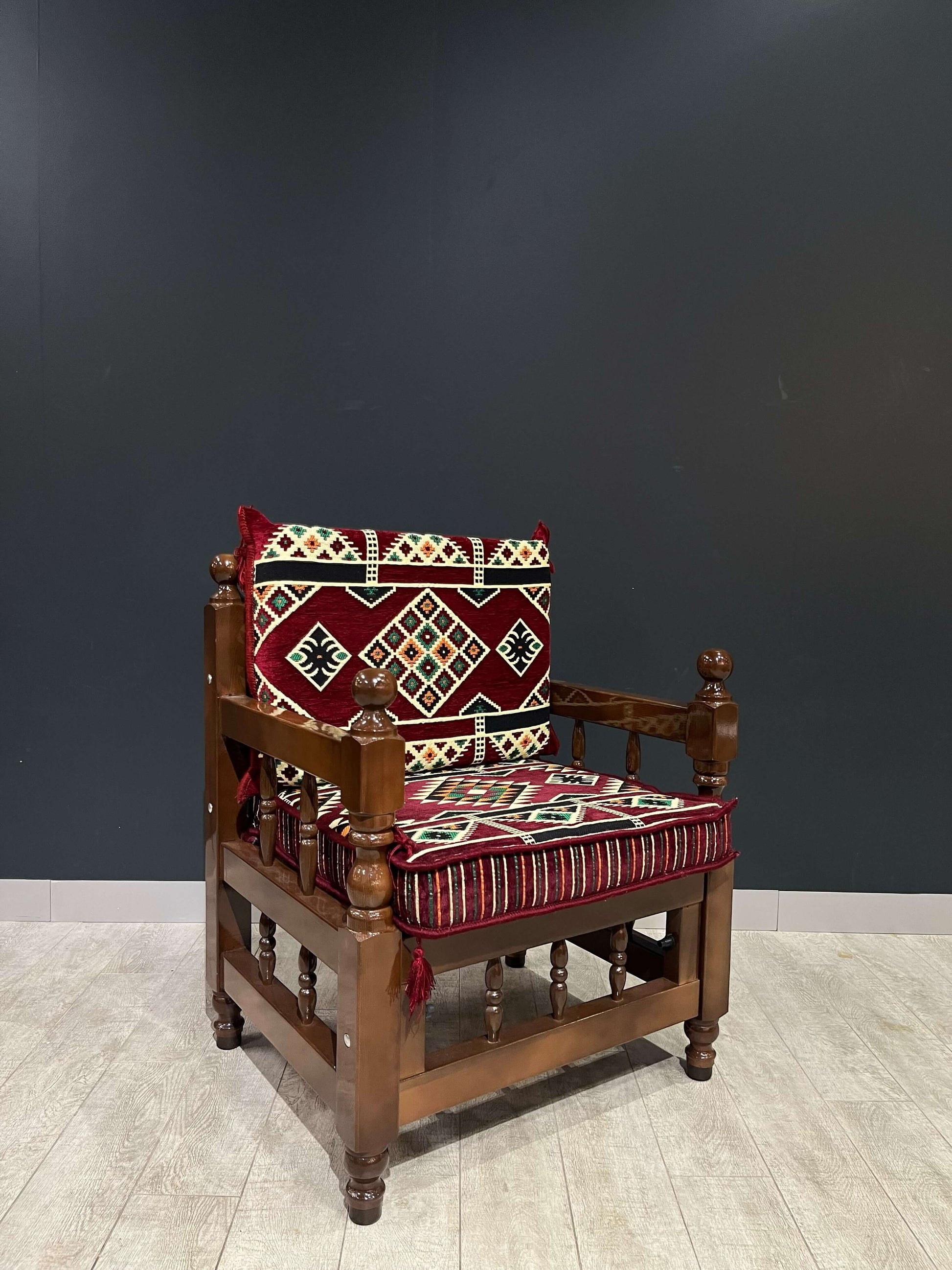 Authentic Armchair (Majlis Maroon Authentic)-Our Authentic Single Chair is expertly crafted from solid Wood Sedir and features Cotton Cushion covers and firm sponge for optimal comfort. Enjoy the comfort and luxury of this elegant chair. Free height under