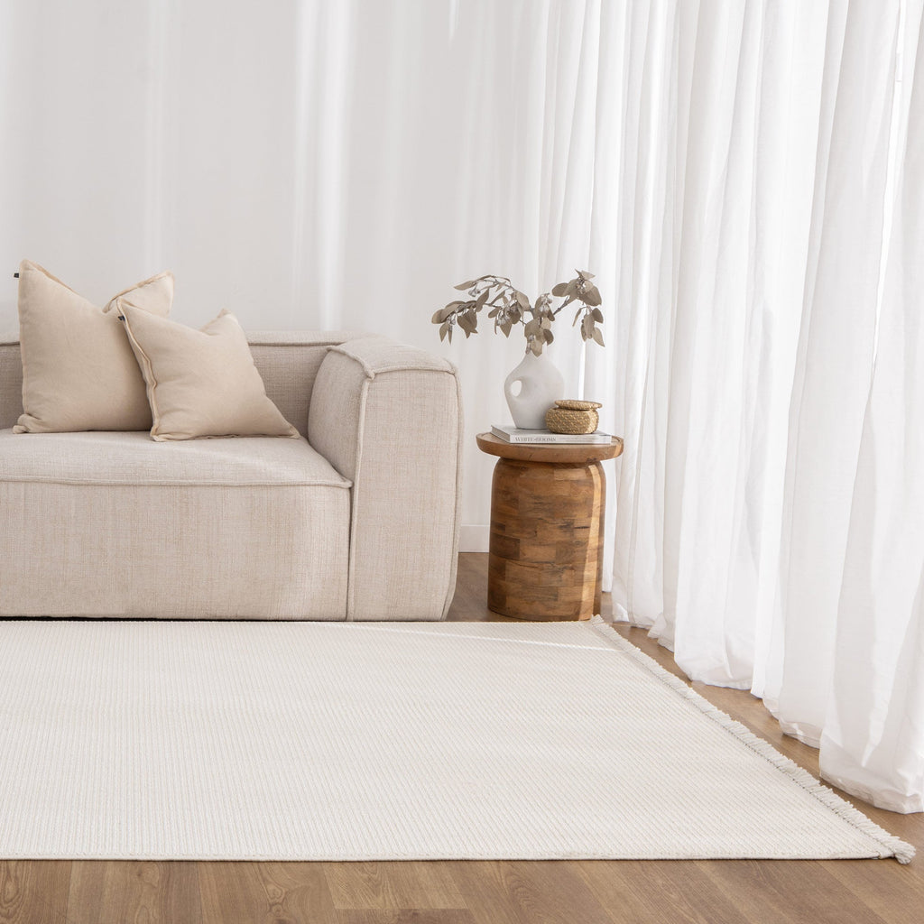 Berno Ivory Loop Rug - B001 styled with furniture