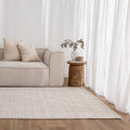 Berno Ivory Beige Loop Rug - B008 styled with furniture