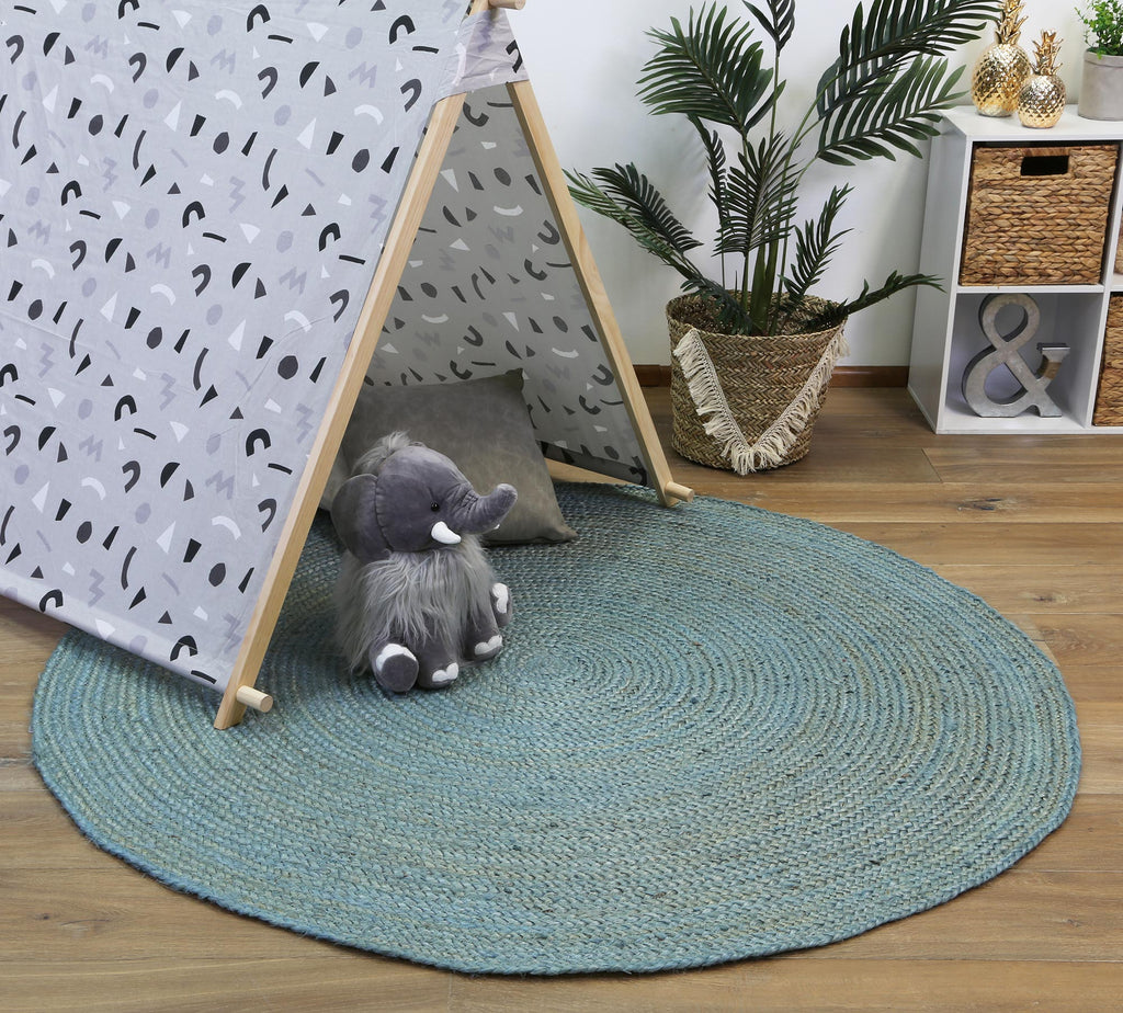 Organica Tundra Blue Jute Round Rug styled with furniture