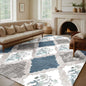 Azure Bloom Vintage Rug Elevate your space with the Azure Bloom Vintage Rug, a stunning fusion of classic floral motifs and modern geometric patterns. Featuring a soothing palette of deep blue, soft ivory, and warm beige, this rug brings a touch of elegan