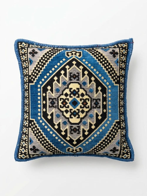 Blue Palace Kilim Cushion featuring intricate blue and black geometric patterns in a 40x40 cm square design.