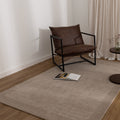 Sedona Camel Border Wool Blend Rug styled with furniture